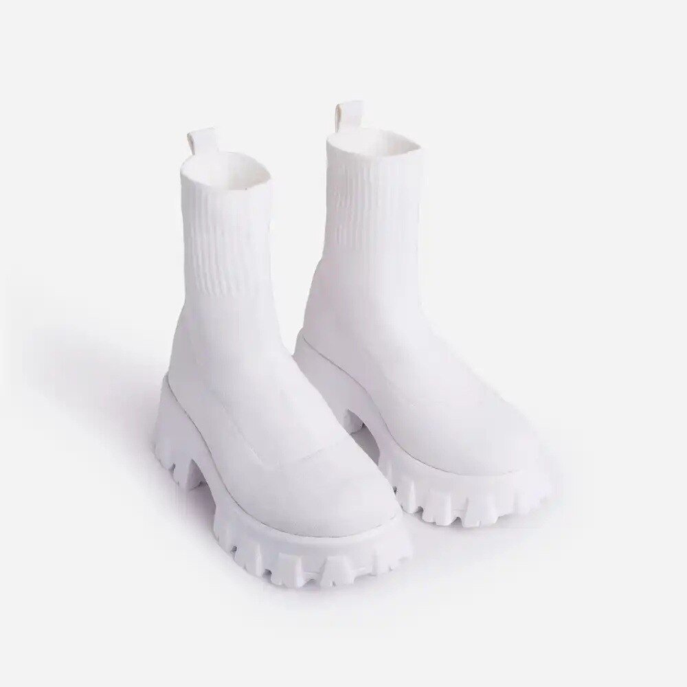 Women's white chunky sole ankle boots with lugged tread
