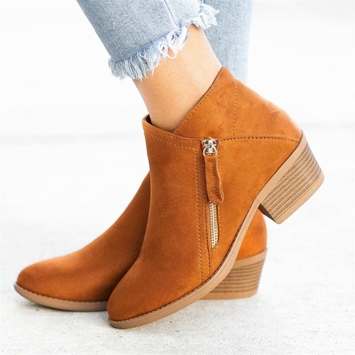 Women's orange leather-look ankle boots with side zip